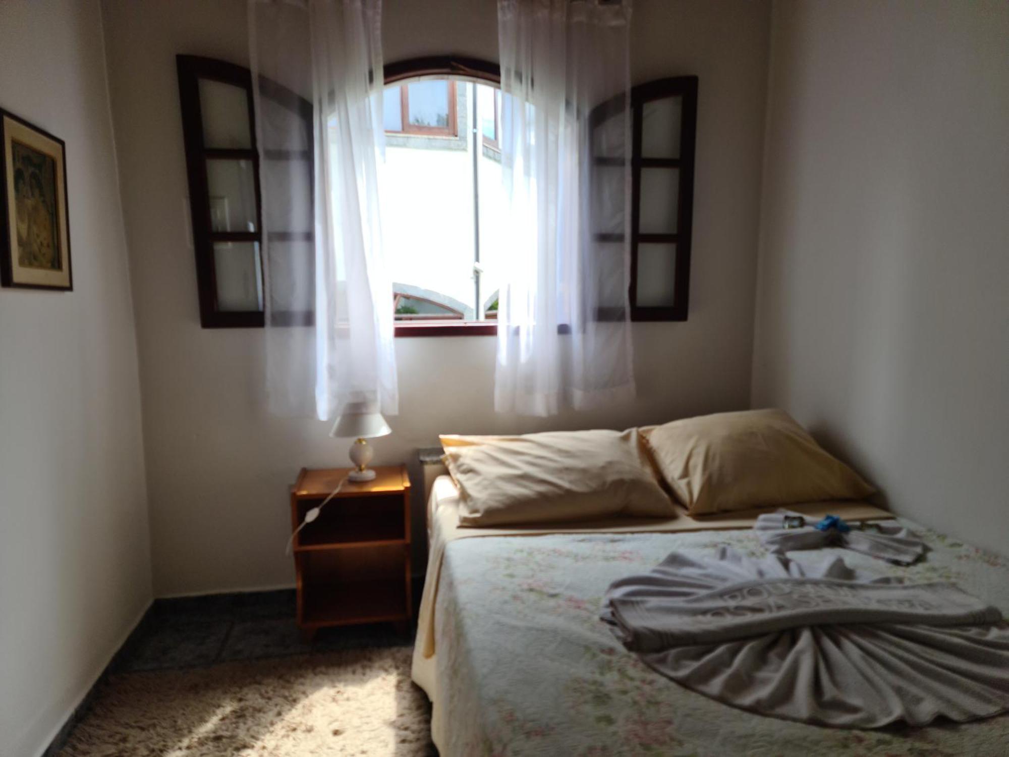 פנדו Pousada Nossa Senhora חדר תמונה A bedroom in a hotel in Brazil