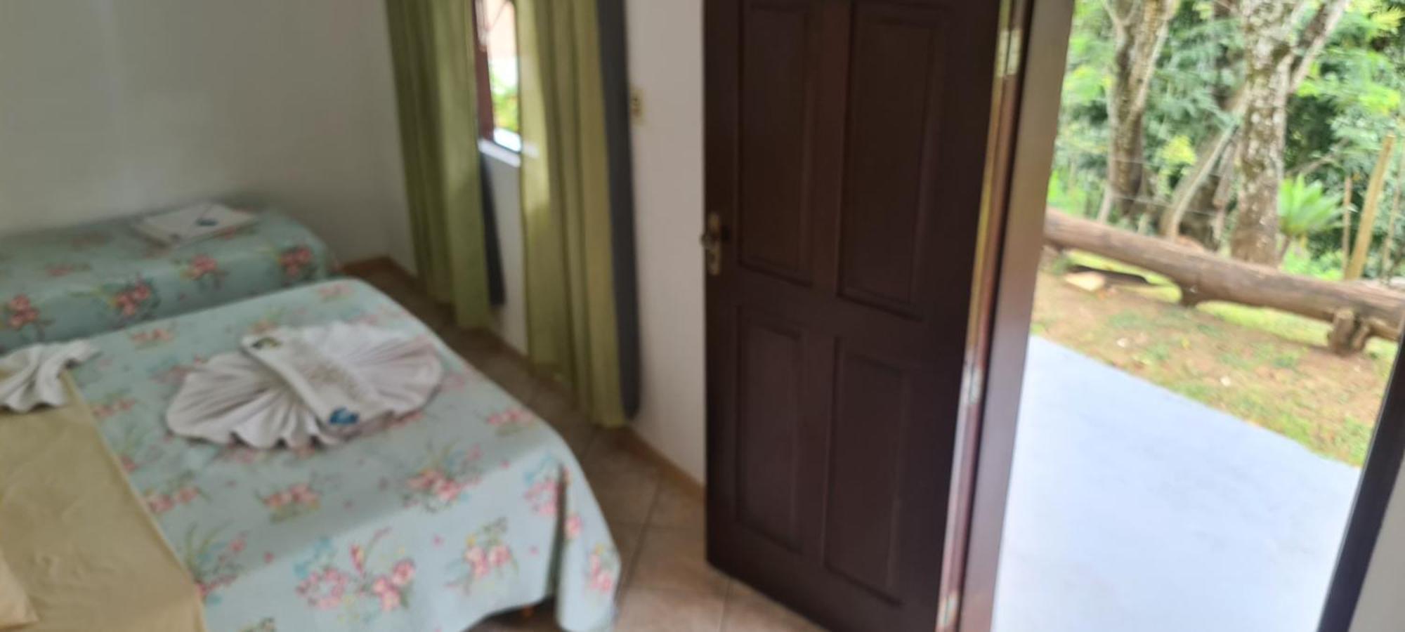 פנדו Pousada Nossa Senhora חדר תמונה A bedroom in a house in Brazil